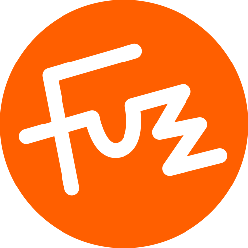 An orange, circular icon showing FuzzGuy's signature.